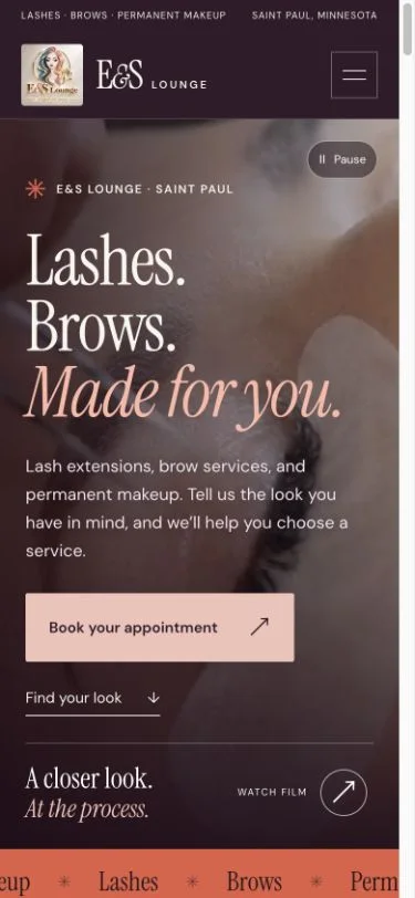 E&S Lounge homepage on a mobile phone